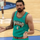 A bearded basketballer shrugs and looks most perturbed.